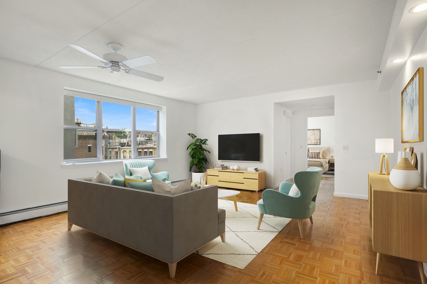 a living room with furniture and a flat screen tv