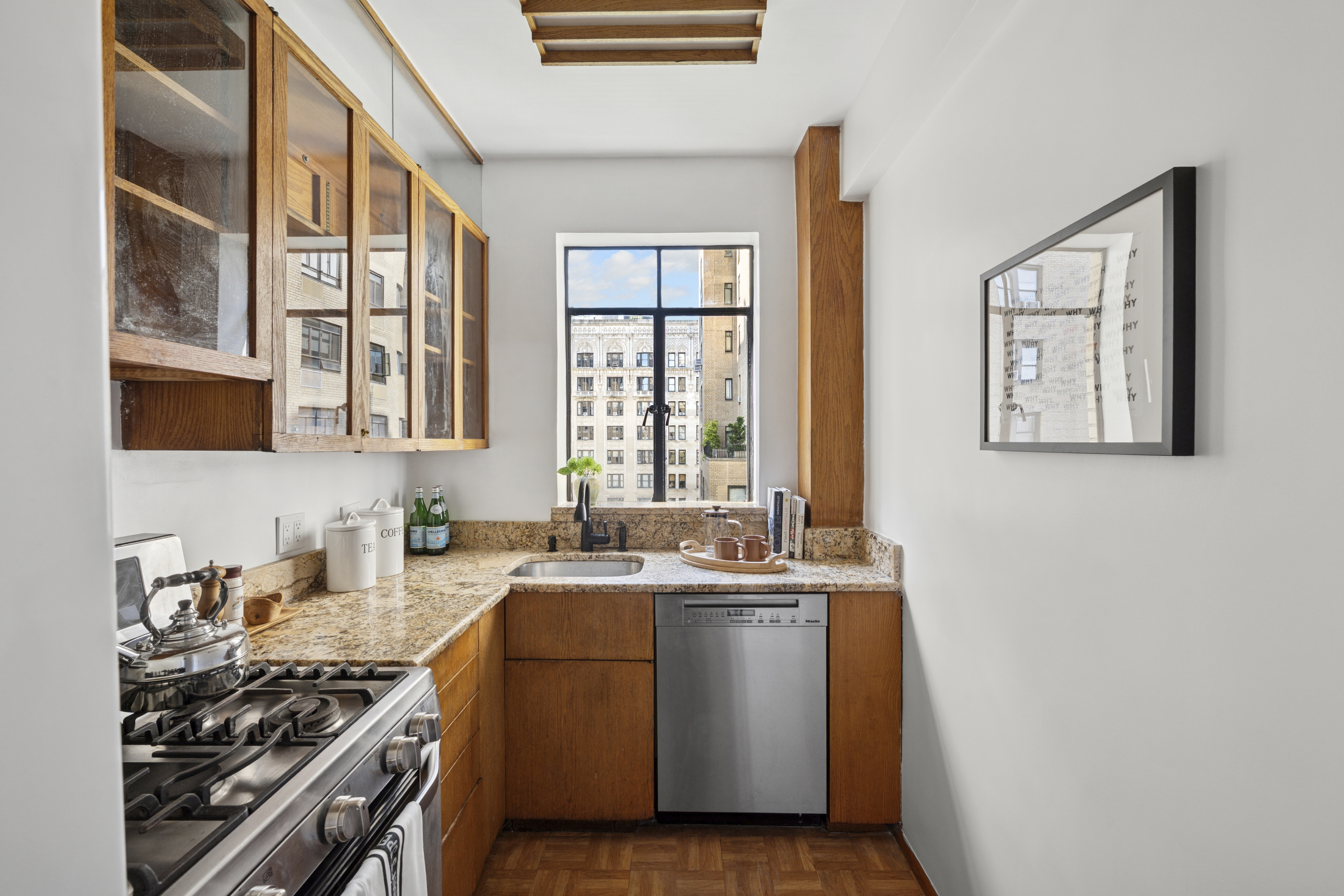 140 Riverside Drive, Unit 10N Manhattan, NY 10024 - Photo 14 of 21 a kitchen that has a sink and a stove