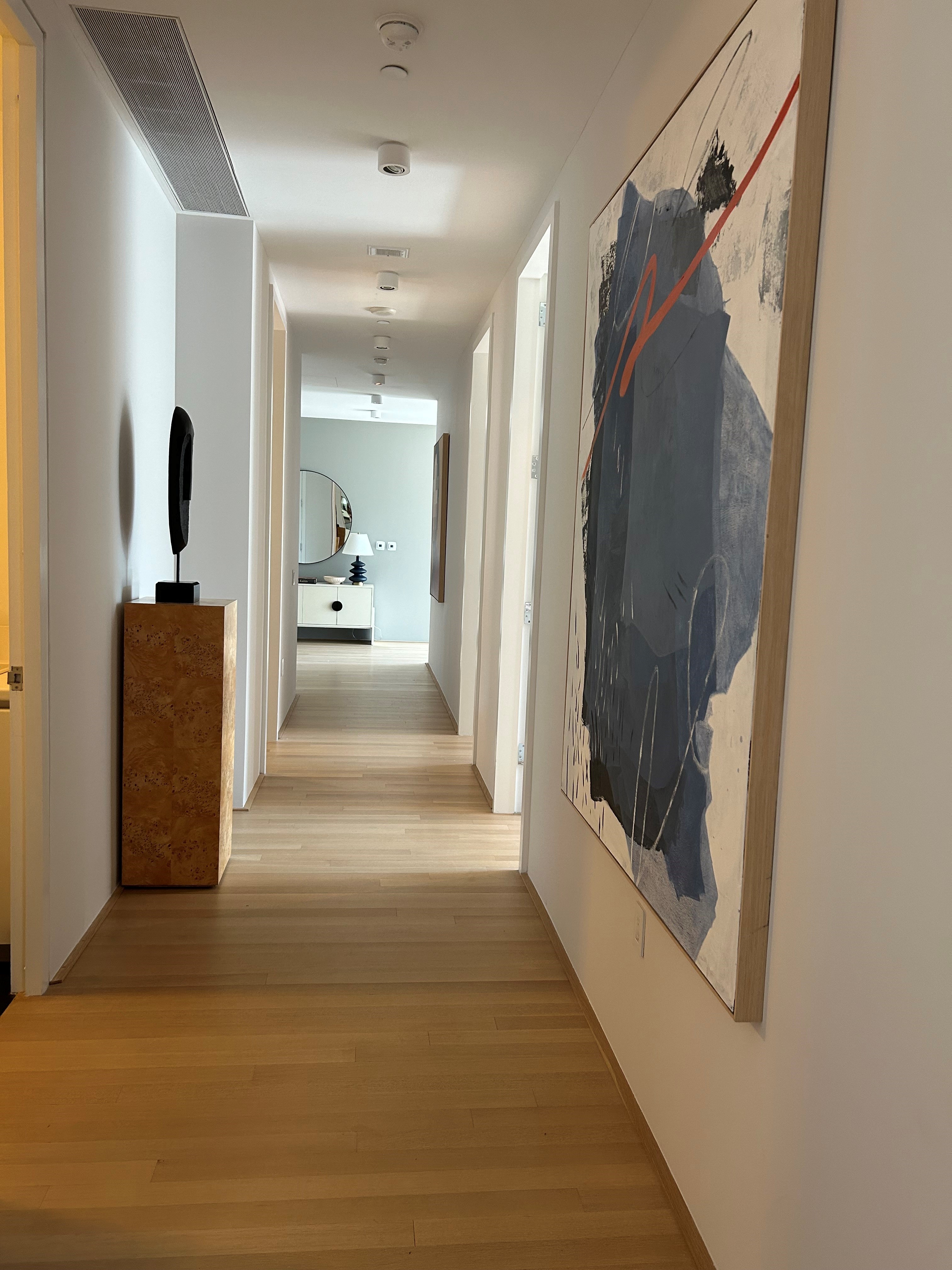 56 Leonard Street, Unit 14BEAST Manhattan, NY 10013 - Photo 9 of 35 a view of a hallway and a livingroom with furniture