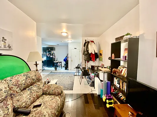 a view of a living room and dining room