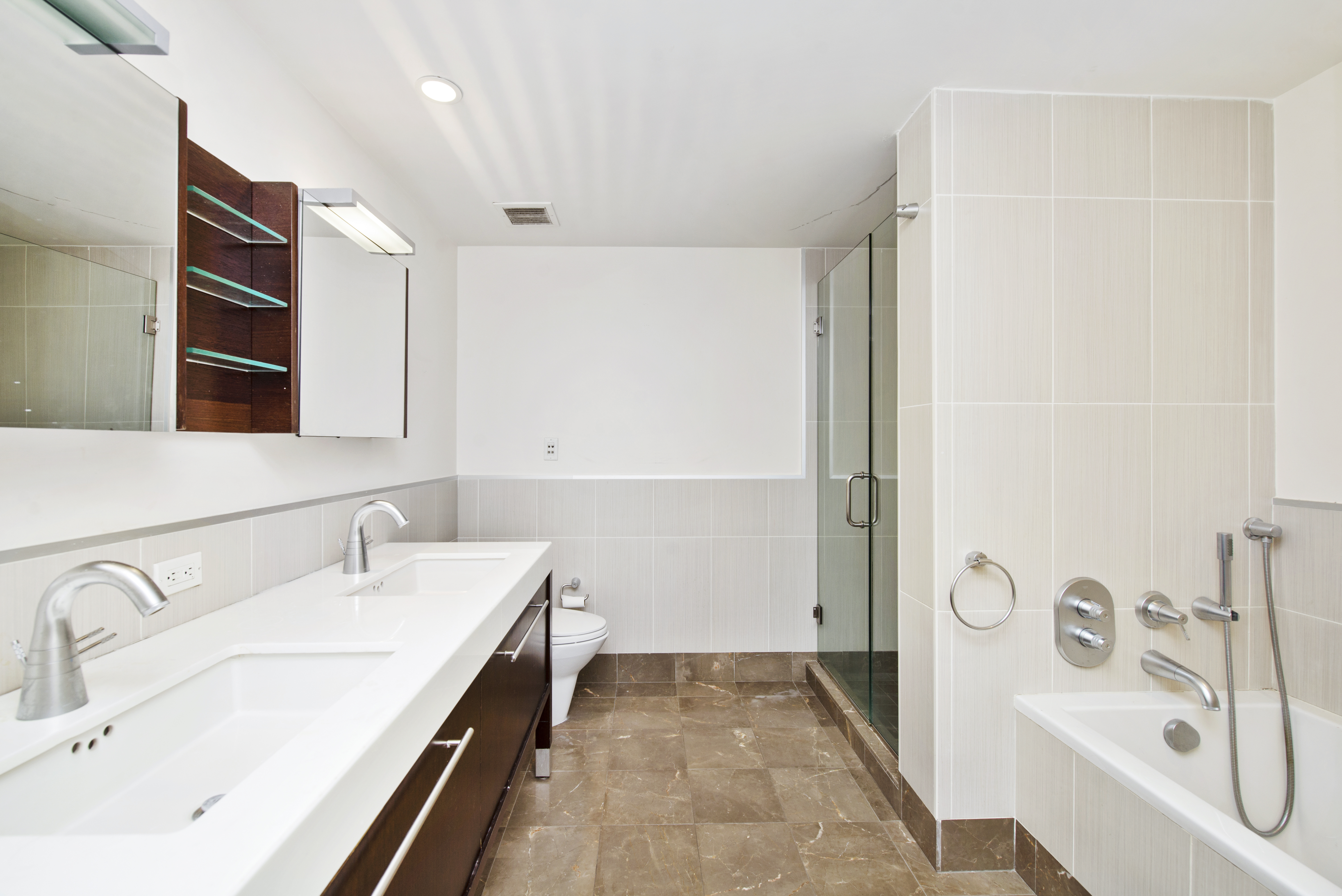225 East 34th Street, Unit 17B Manhattan, NY 10016 - Photo 10 of 24 a bathroom with a sink and a bathtub