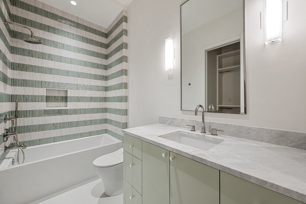 Mt Bonnell Road Austin, TX 78731 - Photo 39 of 51 a bathroom with a sink a toilet and shower