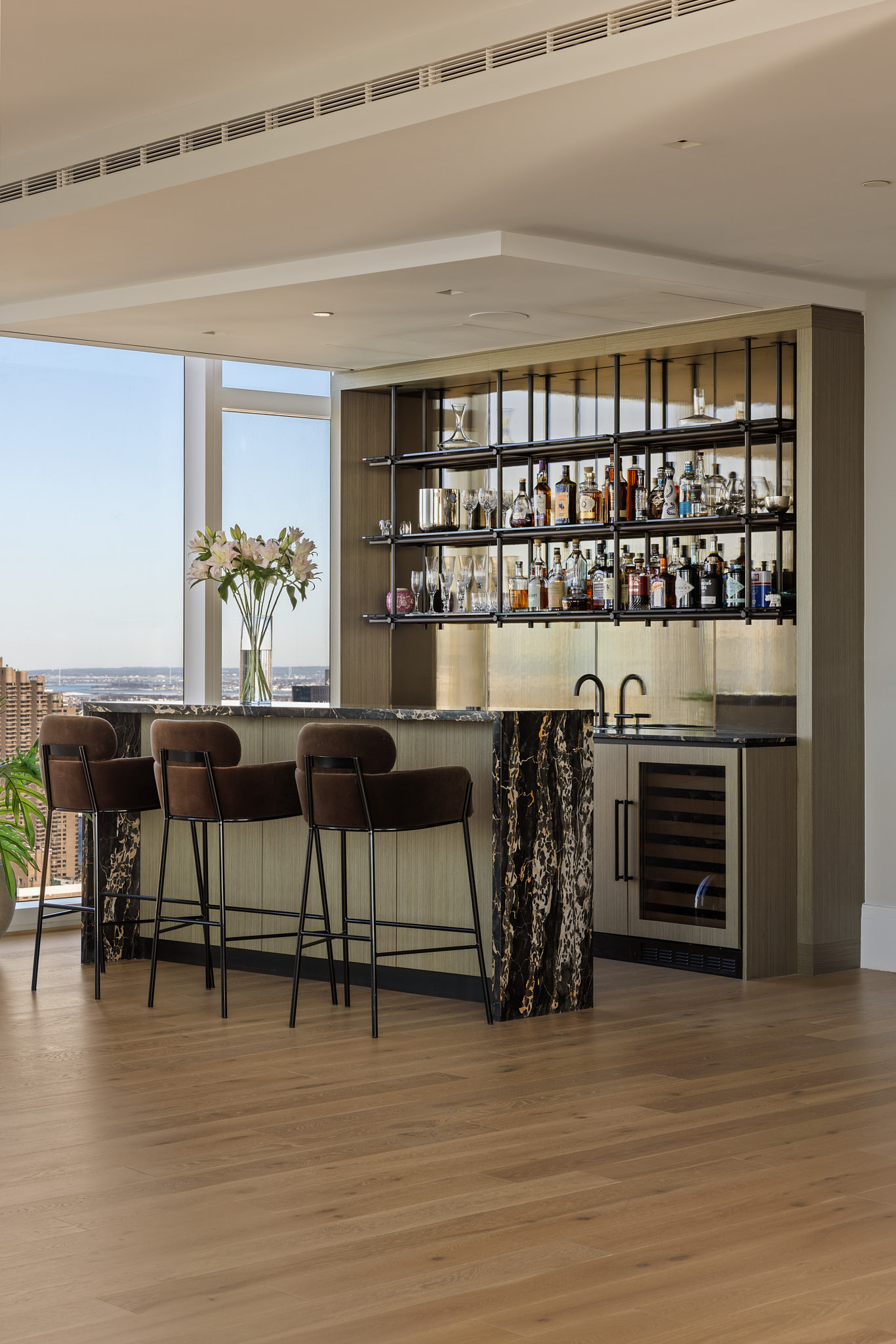 45 East 22nd Street, Unit 52/53B Manhattan, NY 10010 - Photo 7 of 27 a dining room with furniture and wooden floor