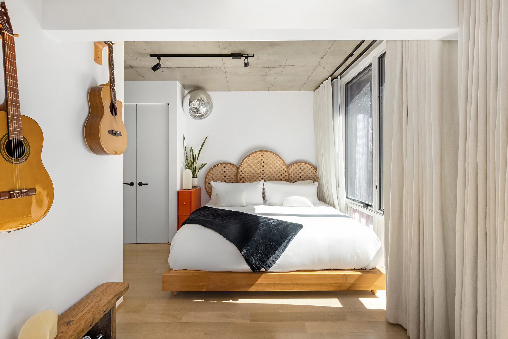 126 South 2nd Street, Unit GARDEN Brooklyn, NY 11249 - Photo 14 of 30 a bedroom with a bed and a dresser