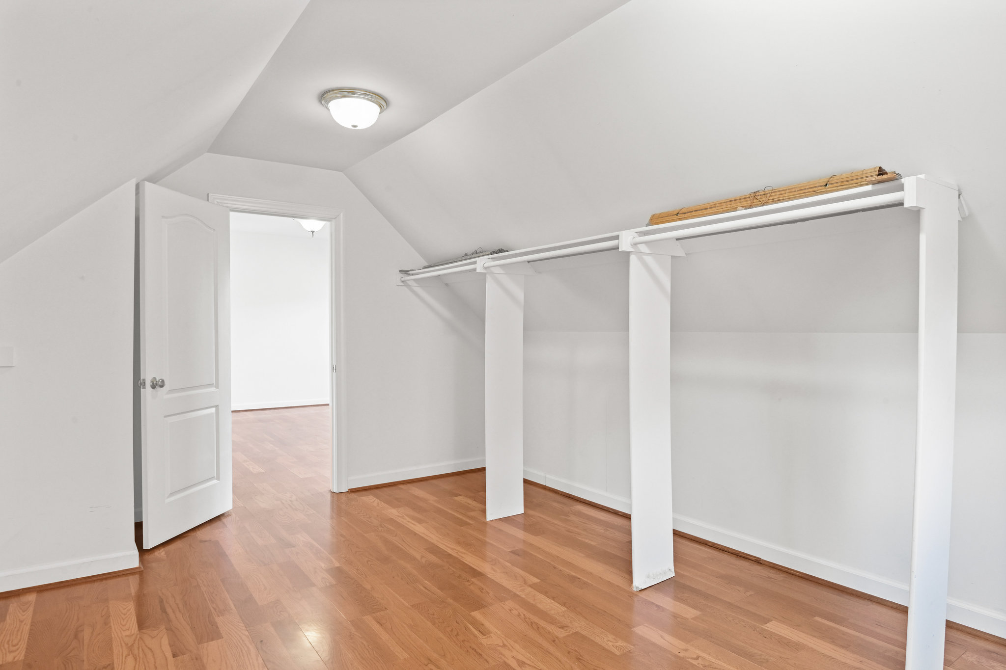 2628 Five Oaks Road Vienna, VA 22181 - Photo 30 of 40 a view of an empty room with wooden floor