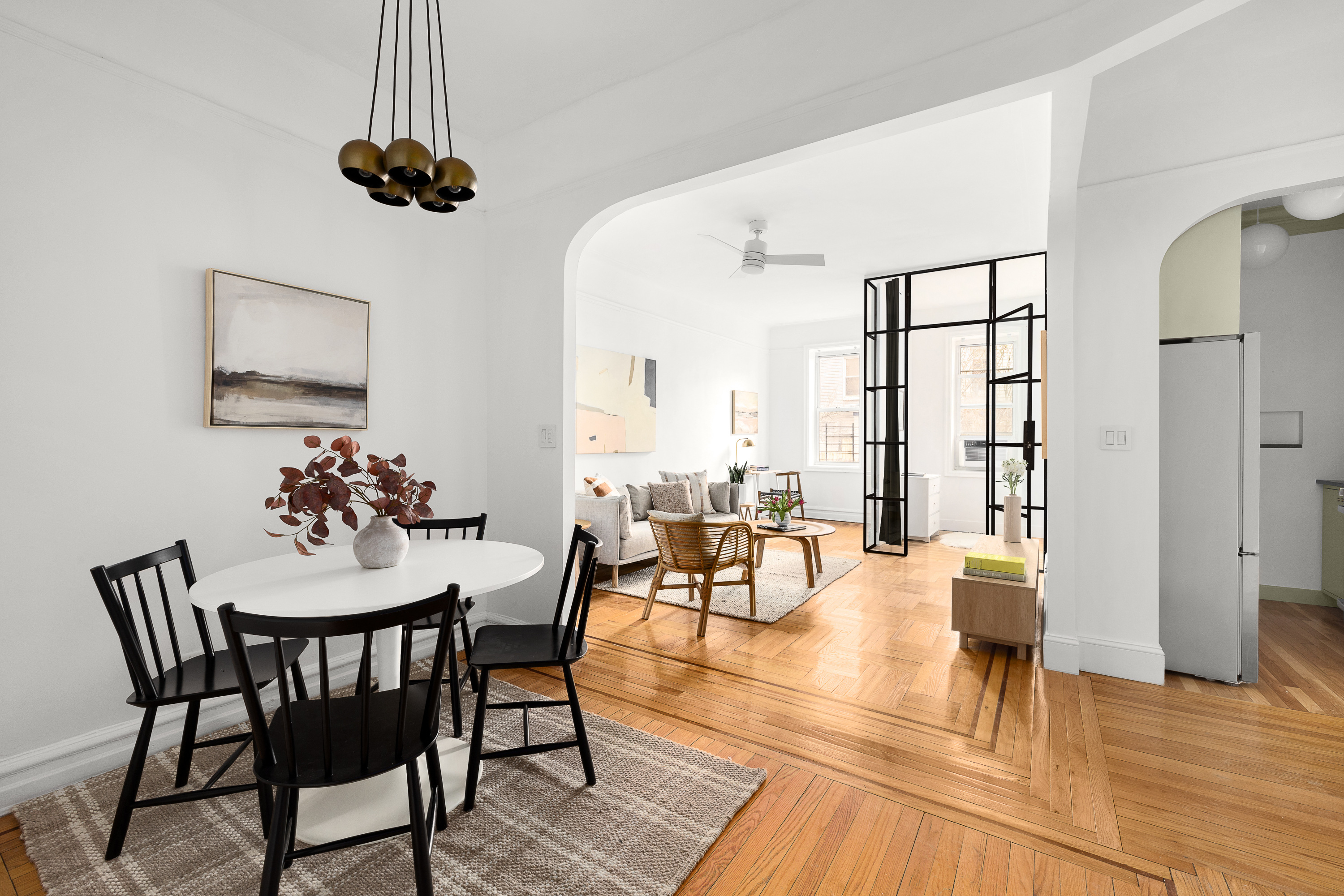 135 Prospect Park Southwest, Unit A6 Brooklyn, NY 11218 - Photo 2 of 10 a view of a dining room with furniture and wooden floor