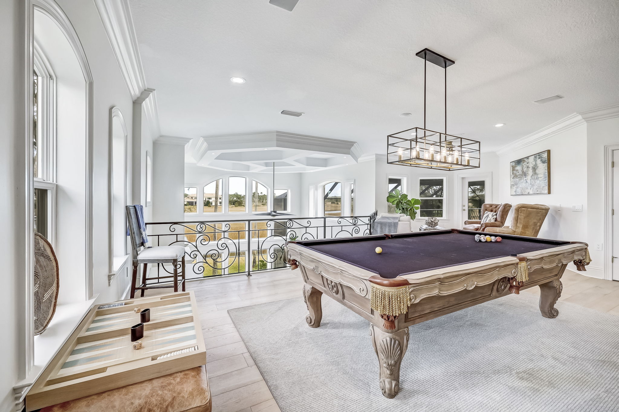 24624 Harbour View Drive Ponte Vedra Beach, FL 32082 - Photo 84 of 186 a room with lots of tables a chandelier and mirrors