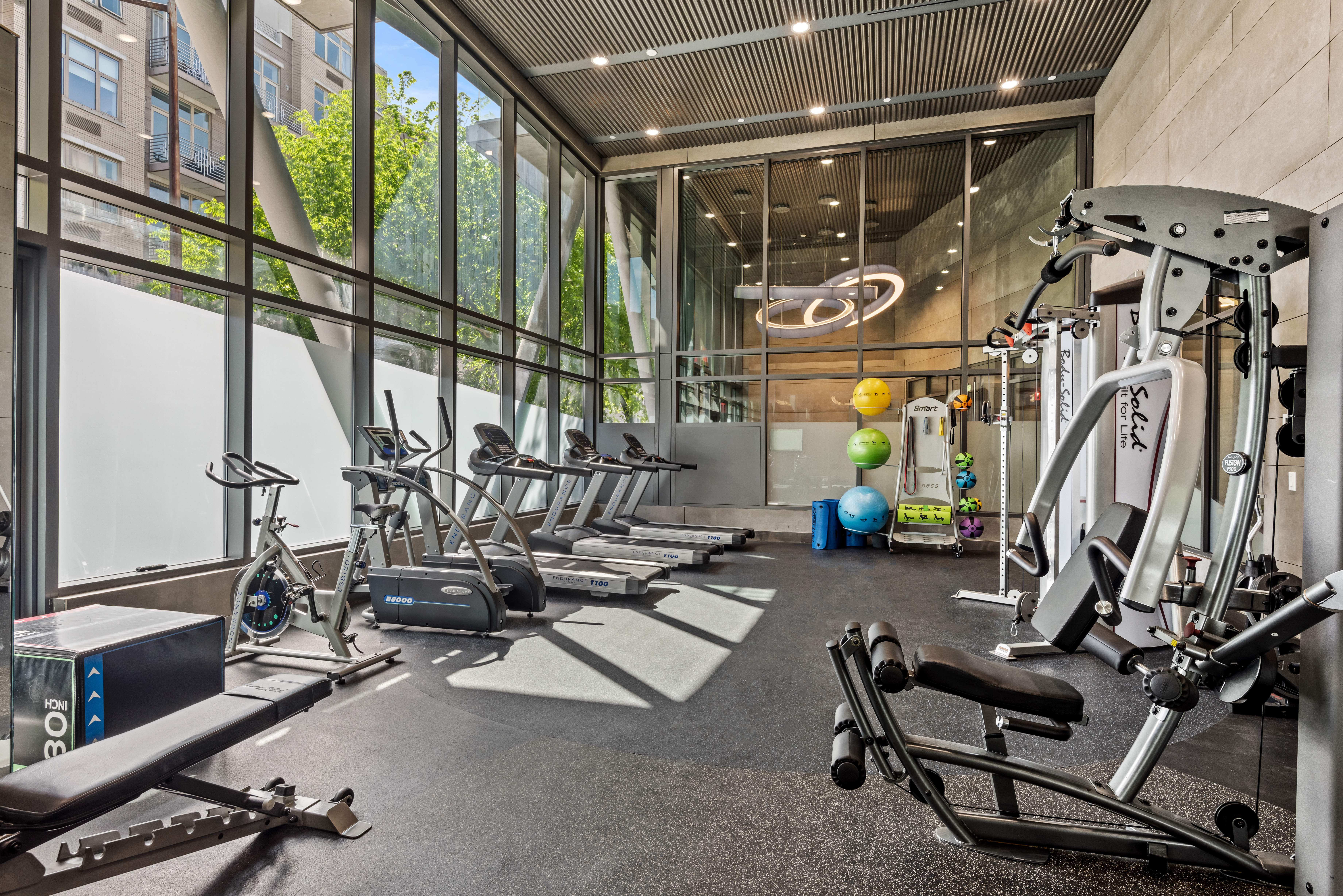 147 Hope Street, Unit 2D Brooklyn, NY 11211 - Photo 12 of 13 a view of a room with gym equipment