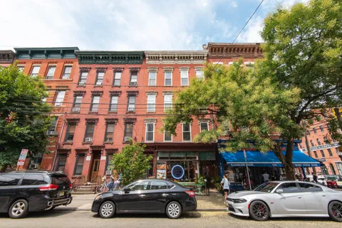 a car parked in front of a building