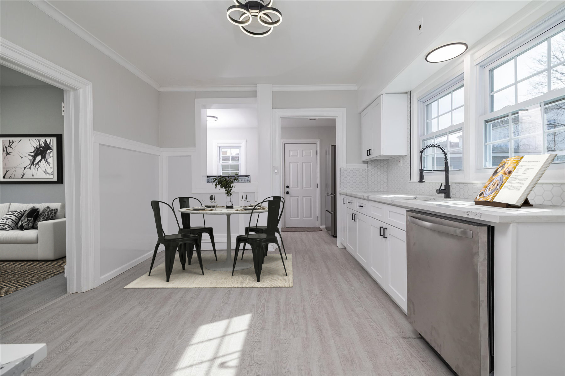 13-03 Brunswick Avenue Queens, NY 11691 - Photo 4 of 27 a view of a dining room with furniture and chandelier