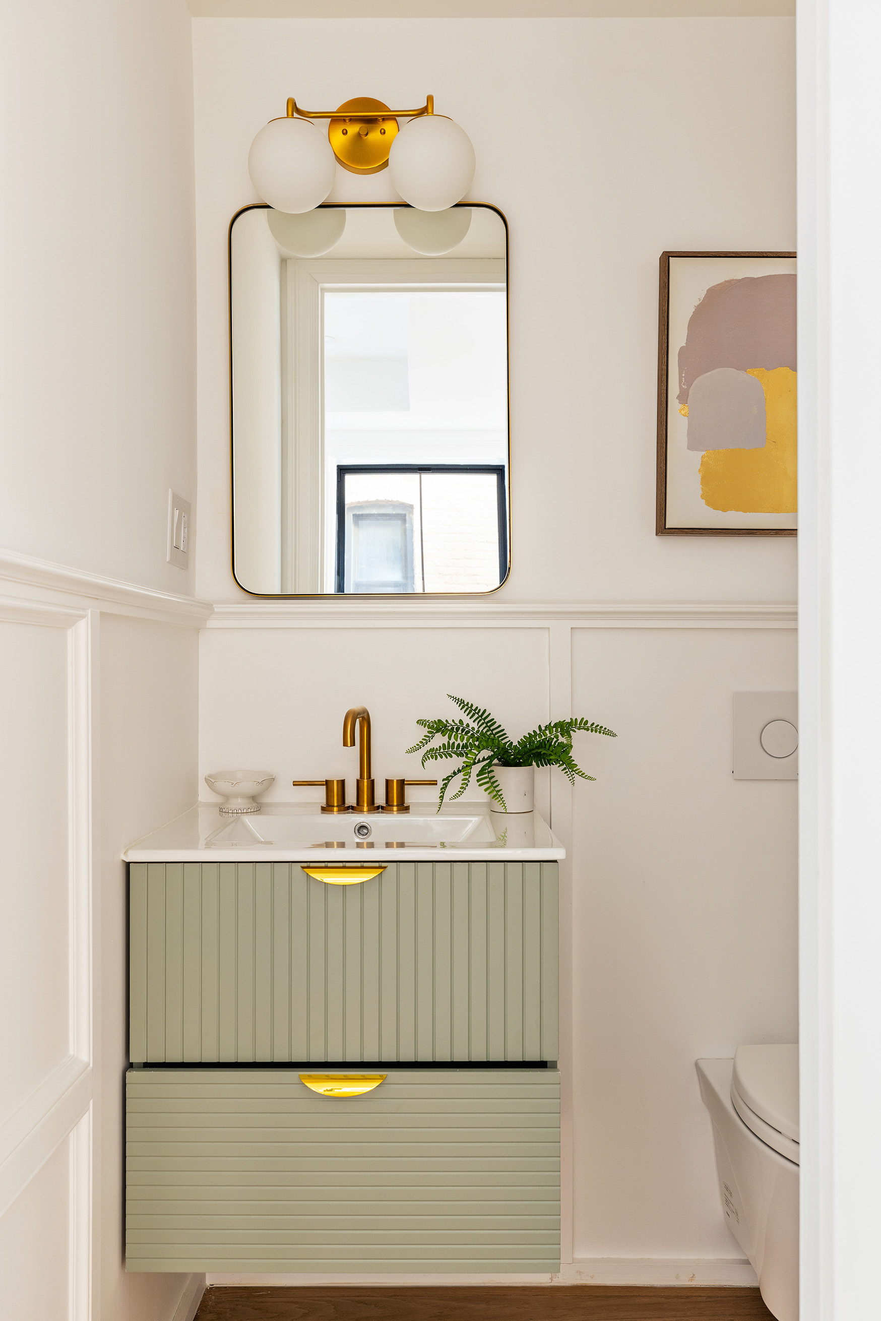 243 East 7th Street Brooklyn, NY 11218 - Photo 7 of 19 a bathroom with a sink and a mirror