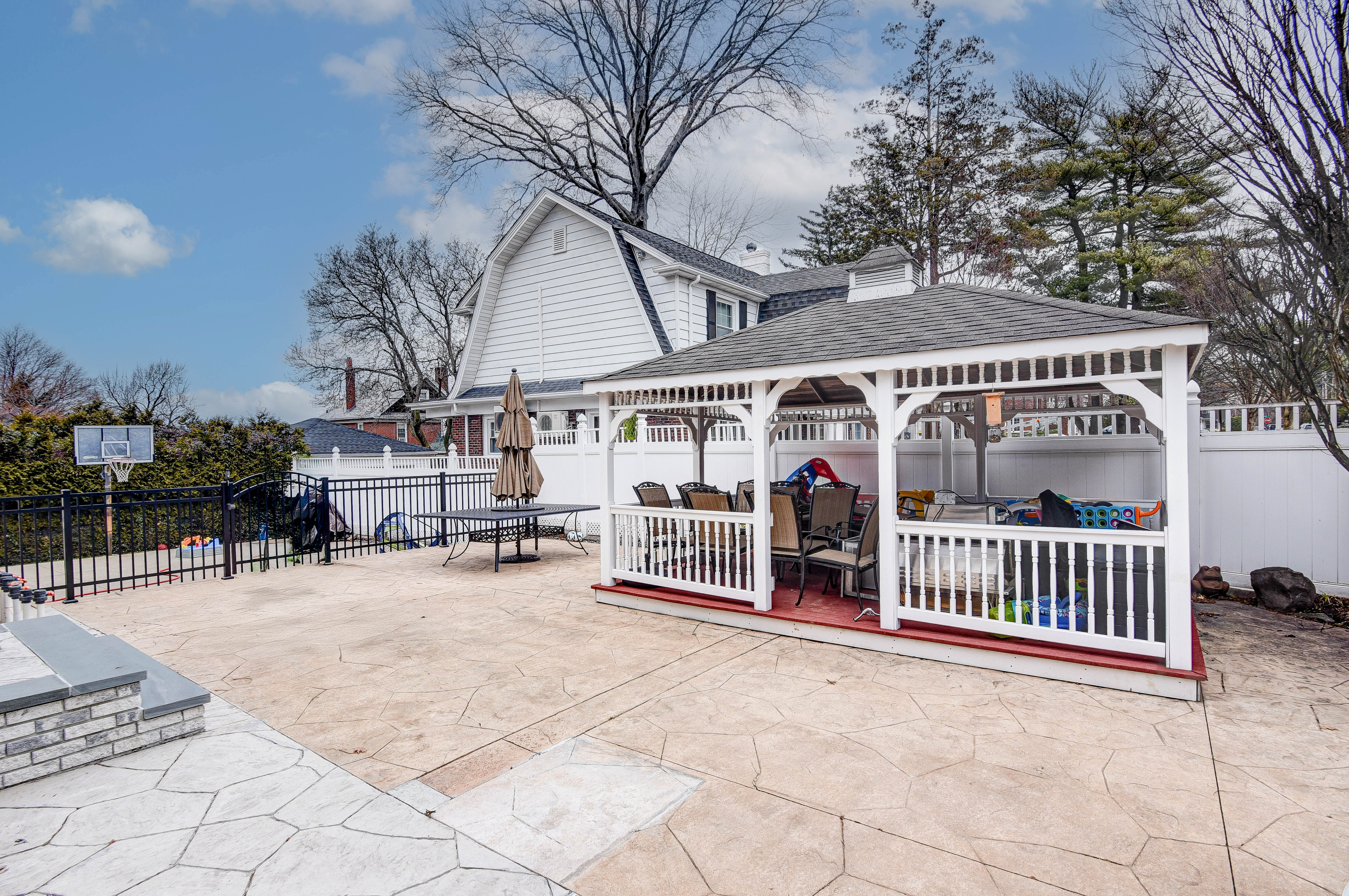 215 Lawrence Avenue Staten Island, NY 10310 - Photo 33 of 45 a view of a chairs and tables in the roof deck