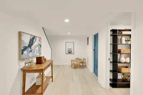 a living room with furniture and a table