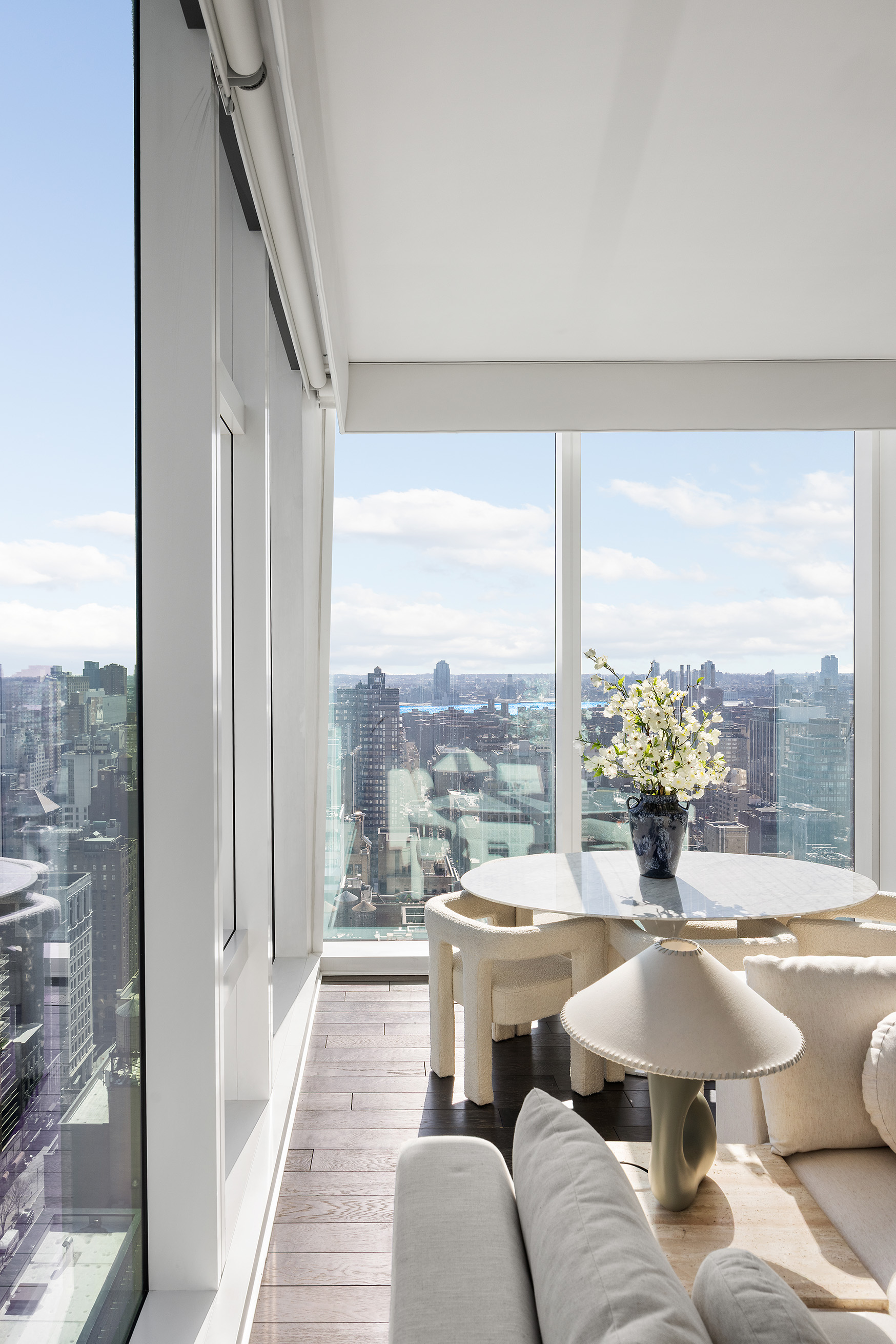 45 East 22nd Street, Unit 32B Manhattan, NY 10010 - Photo 16 of 36 a living room with furniture and a large window