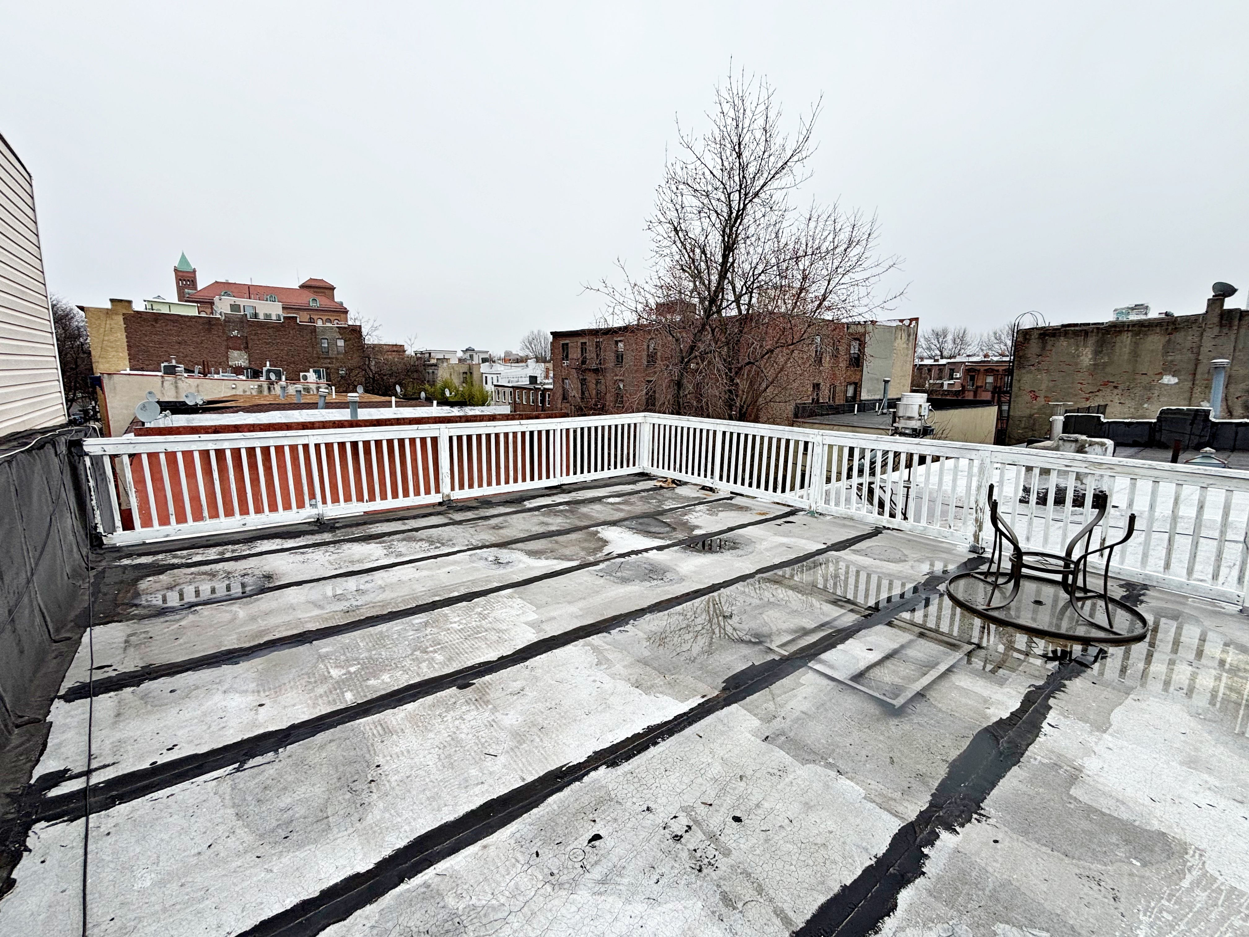 385 Nostrand Avenue, Unit Undisclosed Brooklyn, NY 11216 - Photo 26 of 27 a view of terrace with wooden floor and seating space