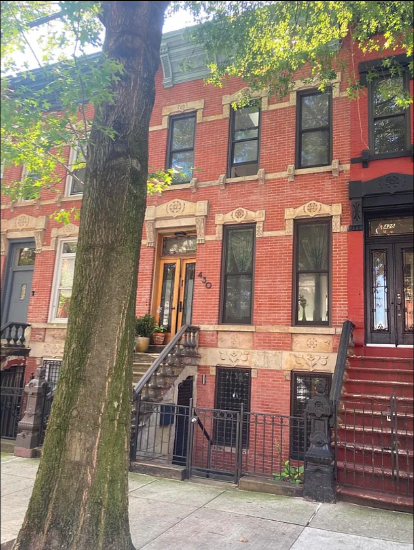 430 East 140th Street, Unit 2 Bronx, NY 10454 - Photo 9 of 10 a front view of a multi story residential apartment building