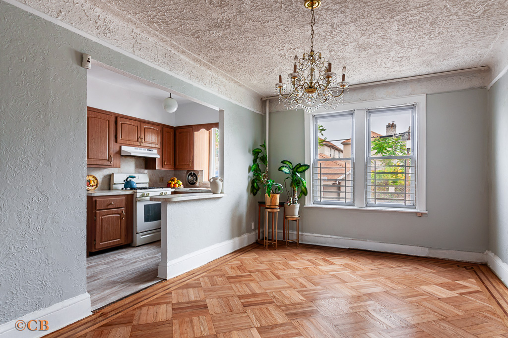 1221 Troy Avenue Brooklyn, NY 11203 - Photo 3 of 10 a view of a kitchen with a sink and a stove