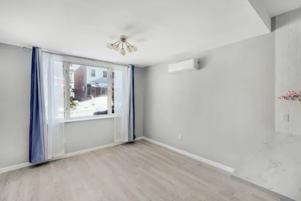 a kitchen with stainless steel appliances a refrigerator and a stove