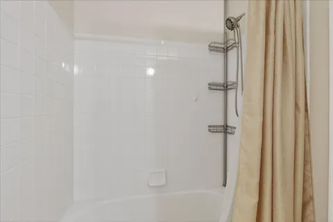 a close view of a bathtub in bathroom