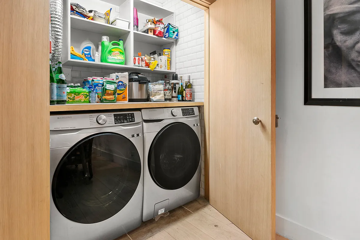 87 Monroe Street, Unit 1 Brooklyn, NY 11216 - Photo 6 of 11 a utility room with dryer and washer