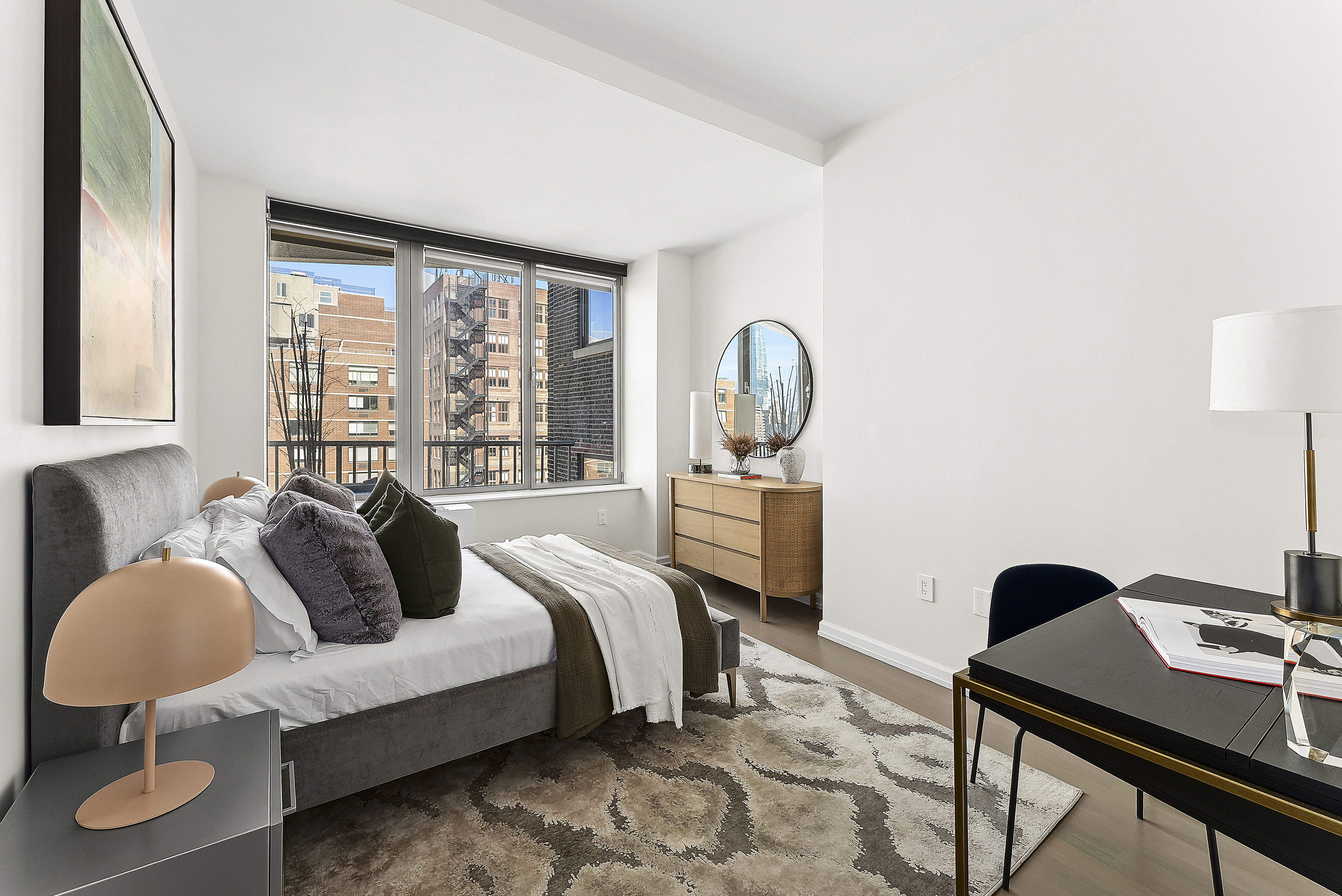 224 West 18th Street, Unit PHA Manhattan, NY 10011 - Photo 20 of 24 a living room with furniture and wooden floor