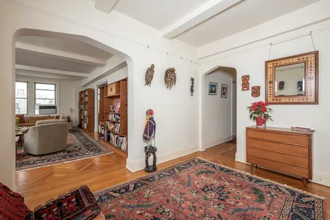 a room with furniture and a rug