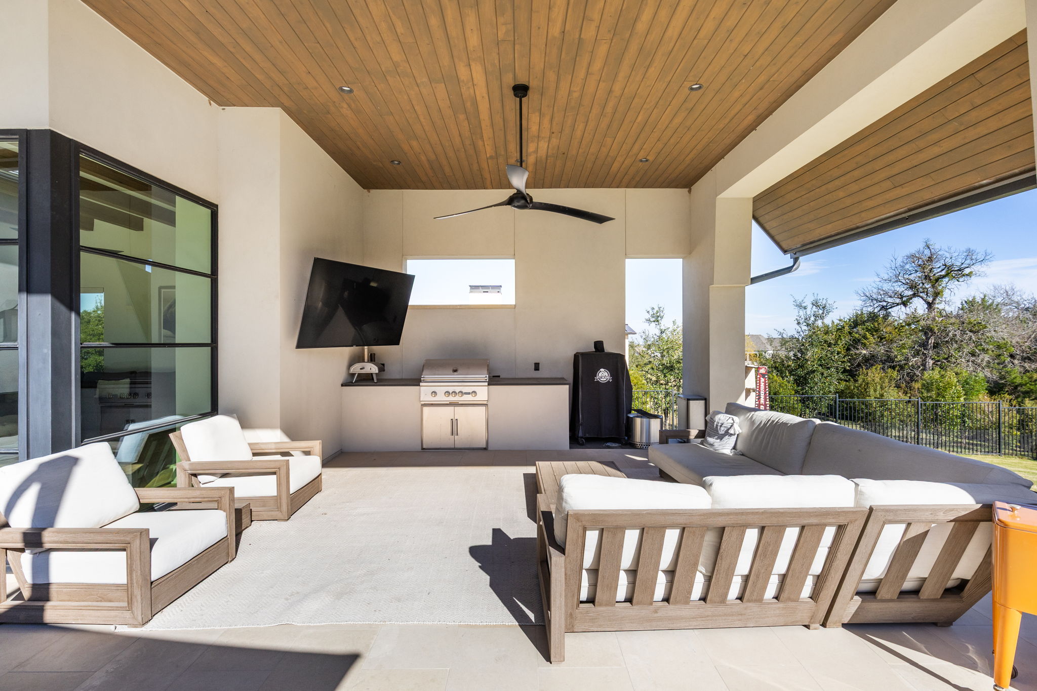 522 Delayne Drive Austin, TX 78737 - Photo 13 of 23 a view of a livingroom with furniture and a flat screen tv