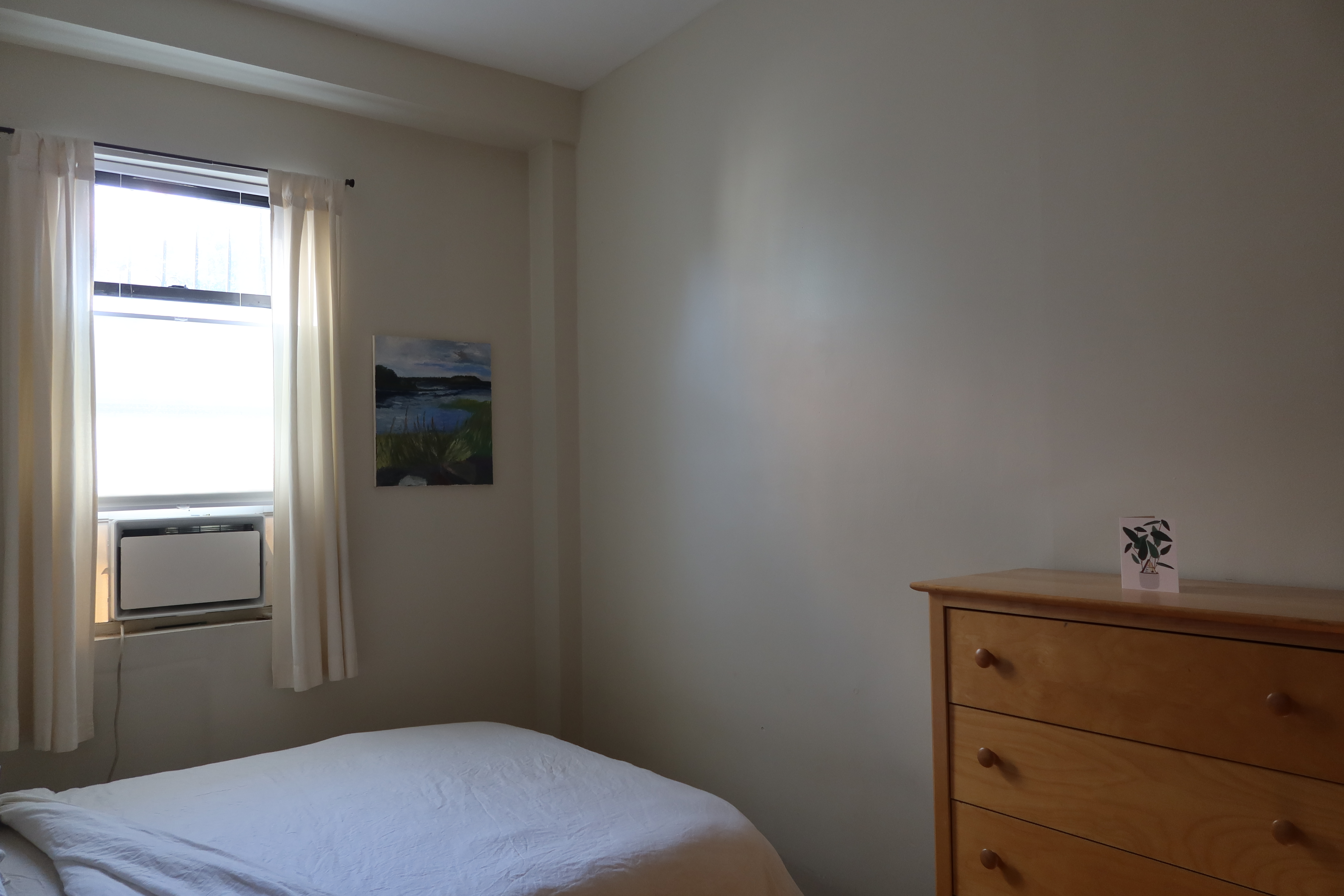 56 Stagg Street, Unit 1A Brooklyn, NY 11206 - Photo 3 of 15 a bedroom with a bed and a window