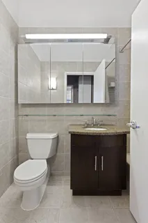 a bathroom with a toilet and a sink