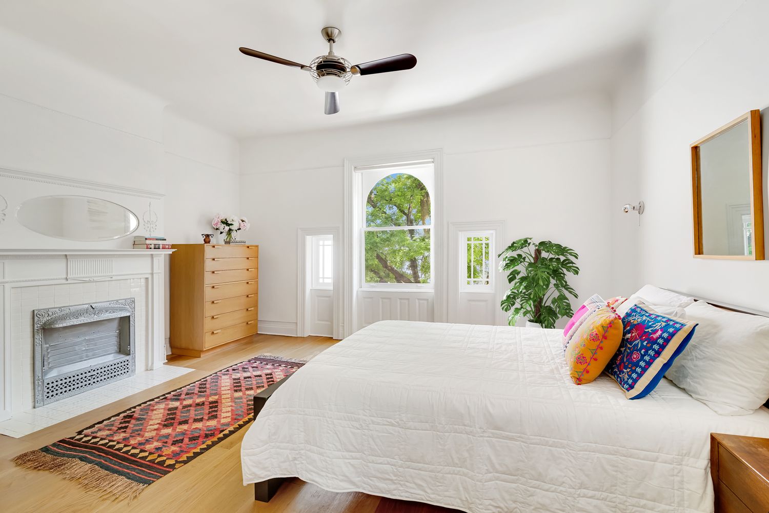 856 St Johns Place Brooklyn, NY 11216 - Photo 7 of 14 a bedroom with a bed dresser and a window