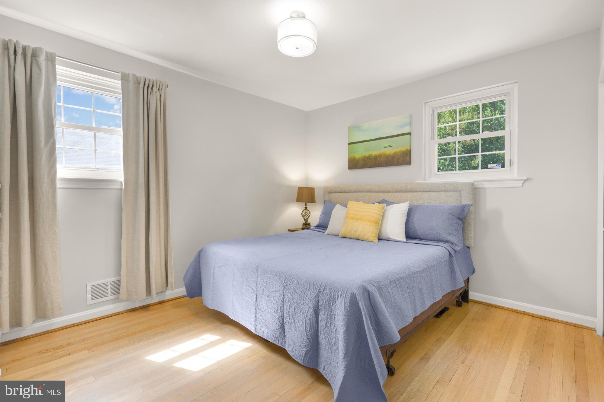 2611 Ross Road Chevy Chase, MD 20815 - Photo 17 of 37 a bedroom with a bed and a window