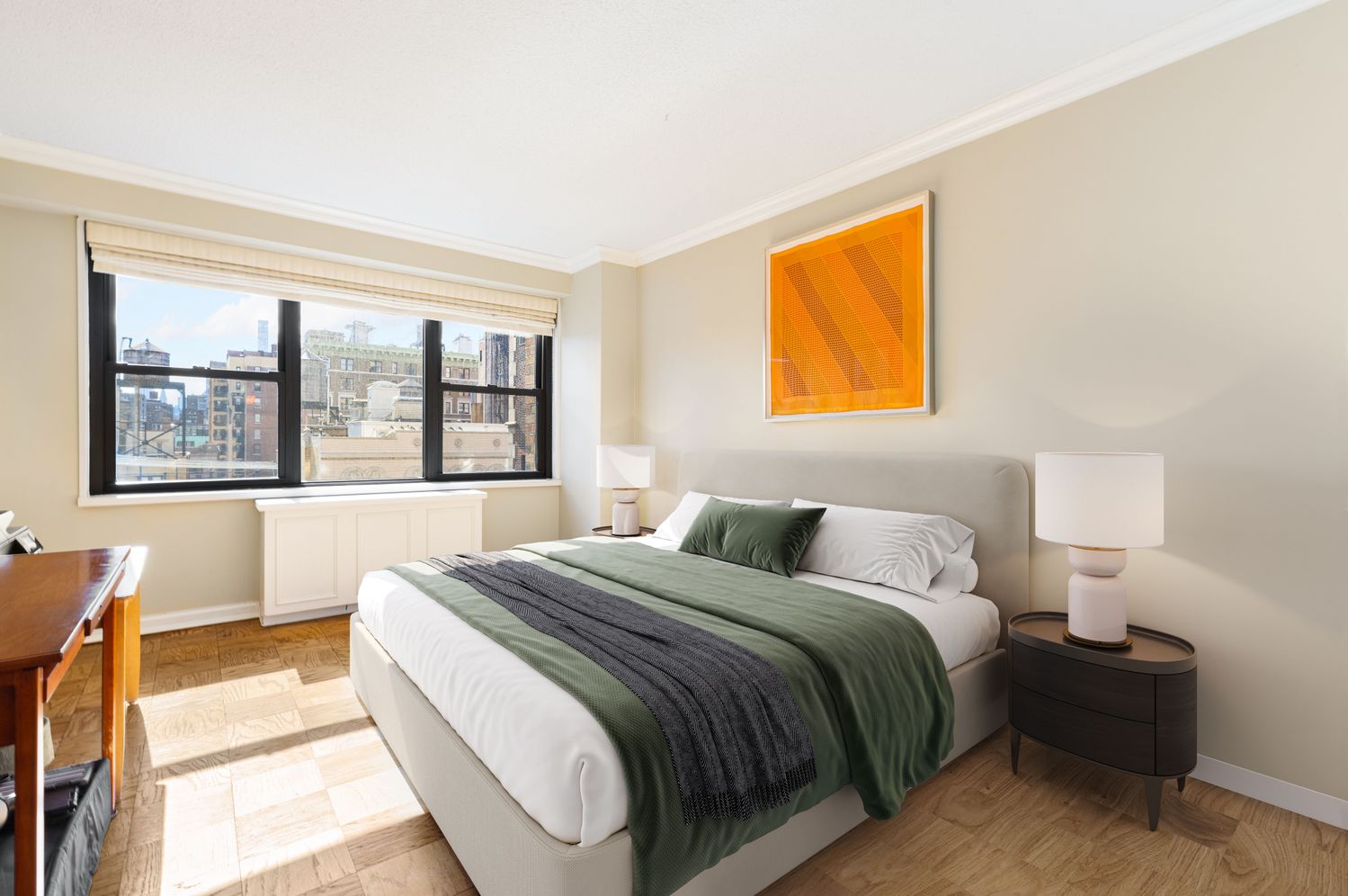 a bedroom with a bed and wooden floor