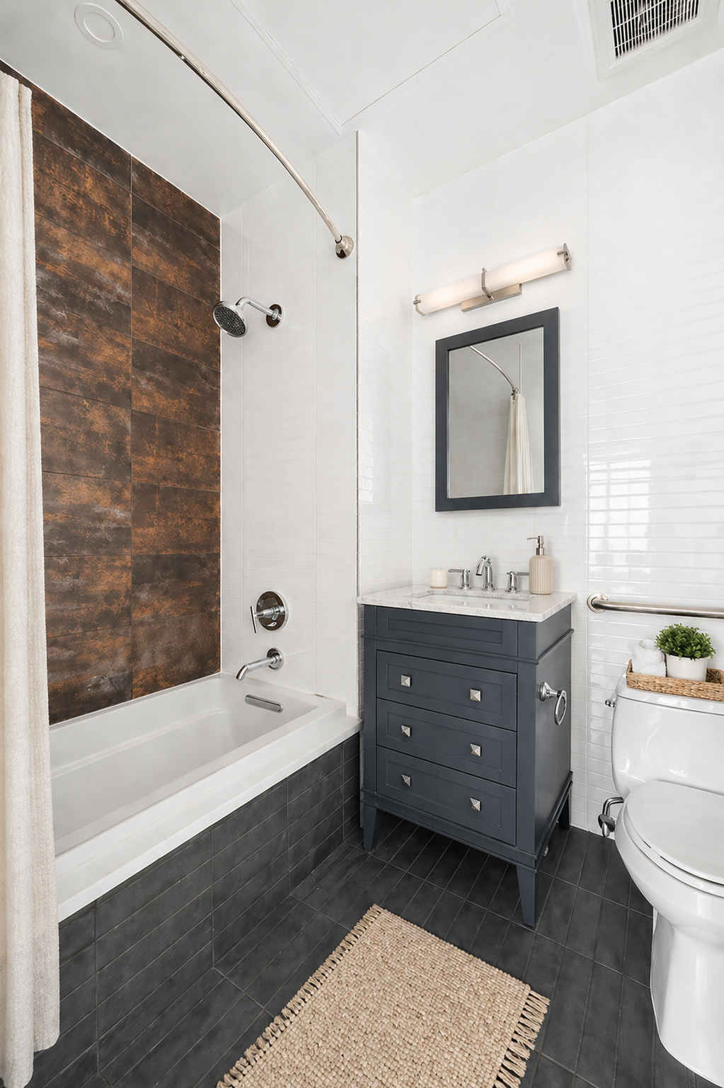 21-24 45th Road, Unit 1 Queens, NY 11101 - Photo 6 of 8 a bathroom with a tub sink double vanity and mirror