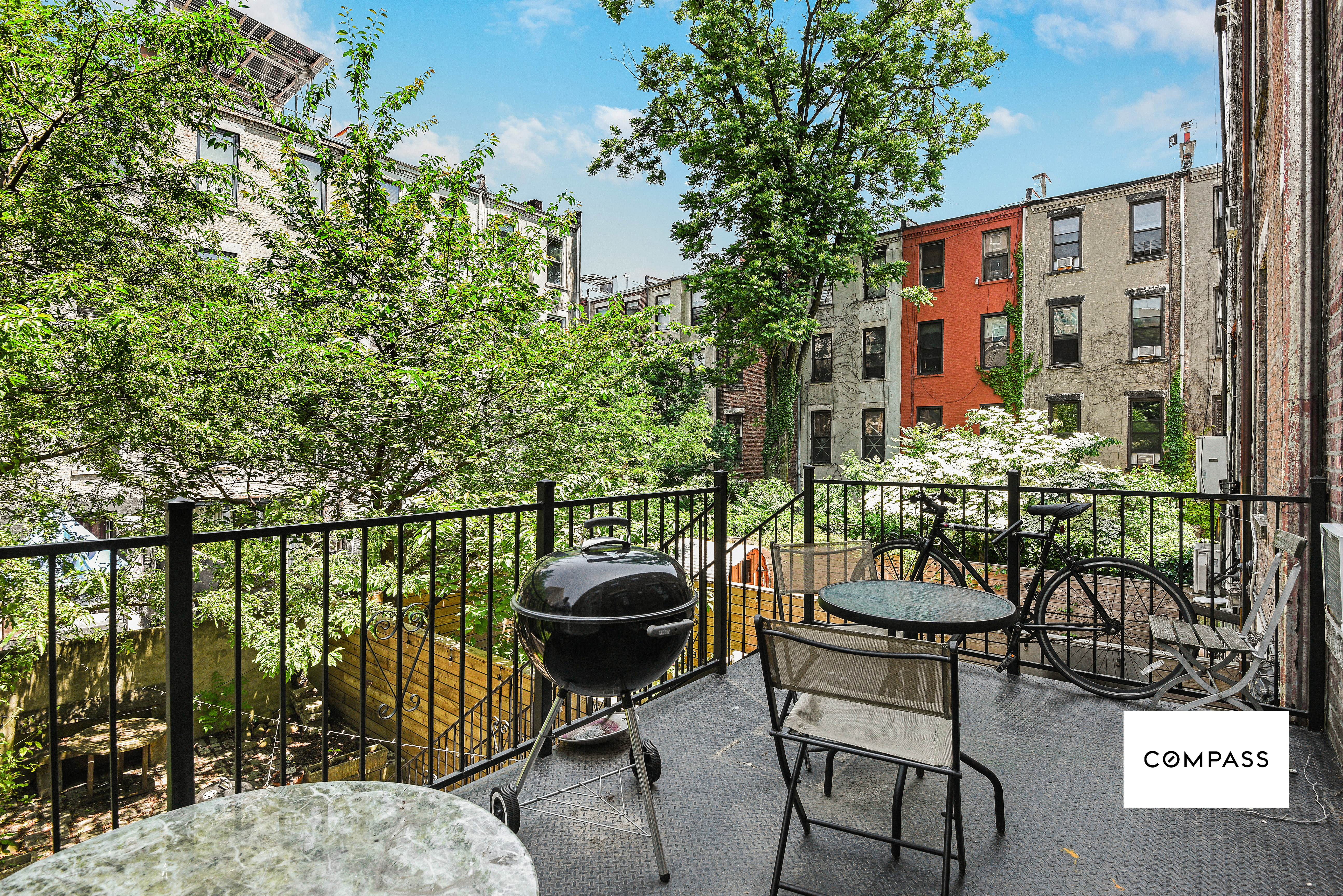 347 West 121st Street Manhattan, NY 10027 - Photo 8 of 10 a balcony with chairs and with potted plants