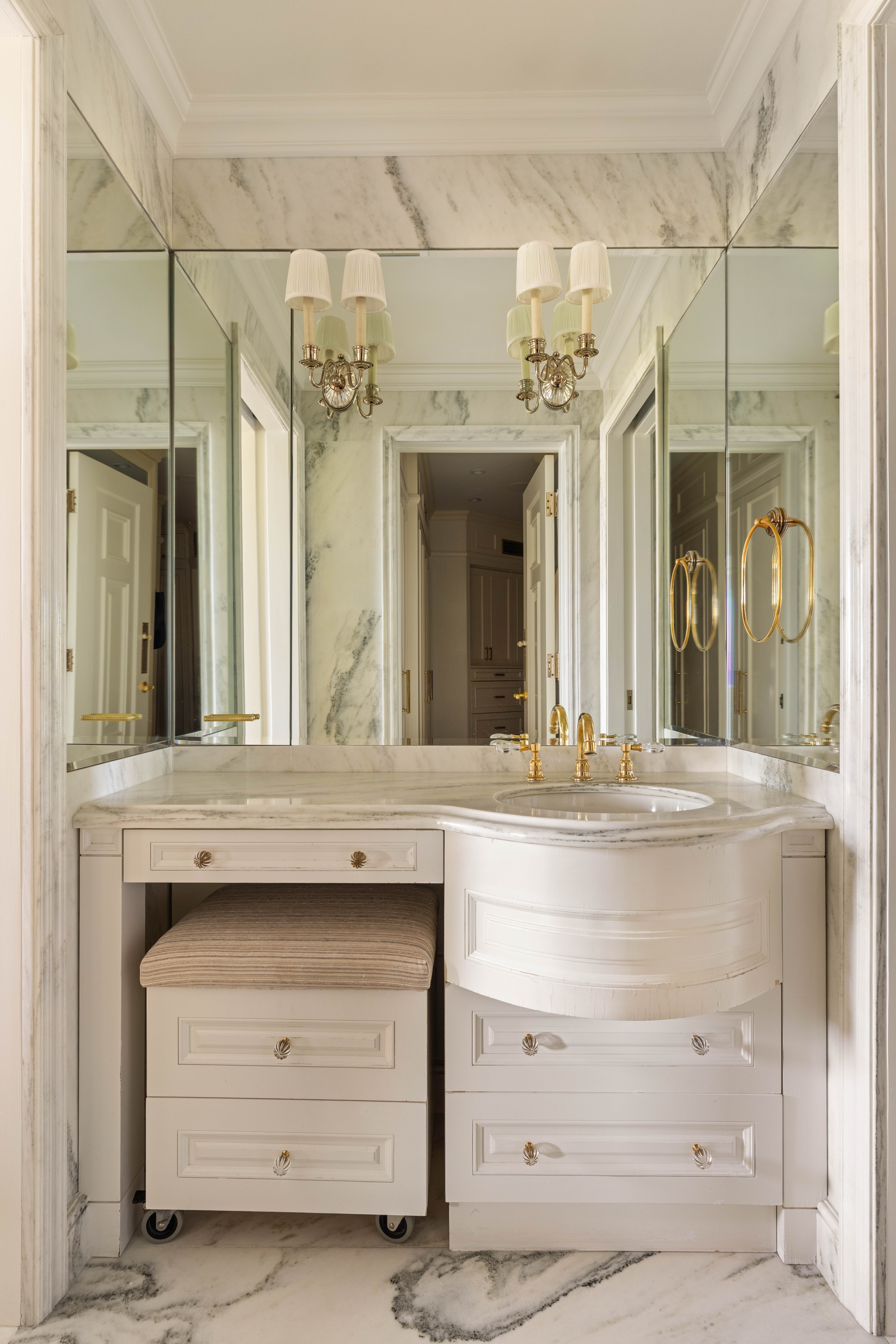 530 East 76th Street, Unit 8CD Manhattan, NY 10021 - Photo 15 of 21 a bathroom with a sink vanity granite and a mirror