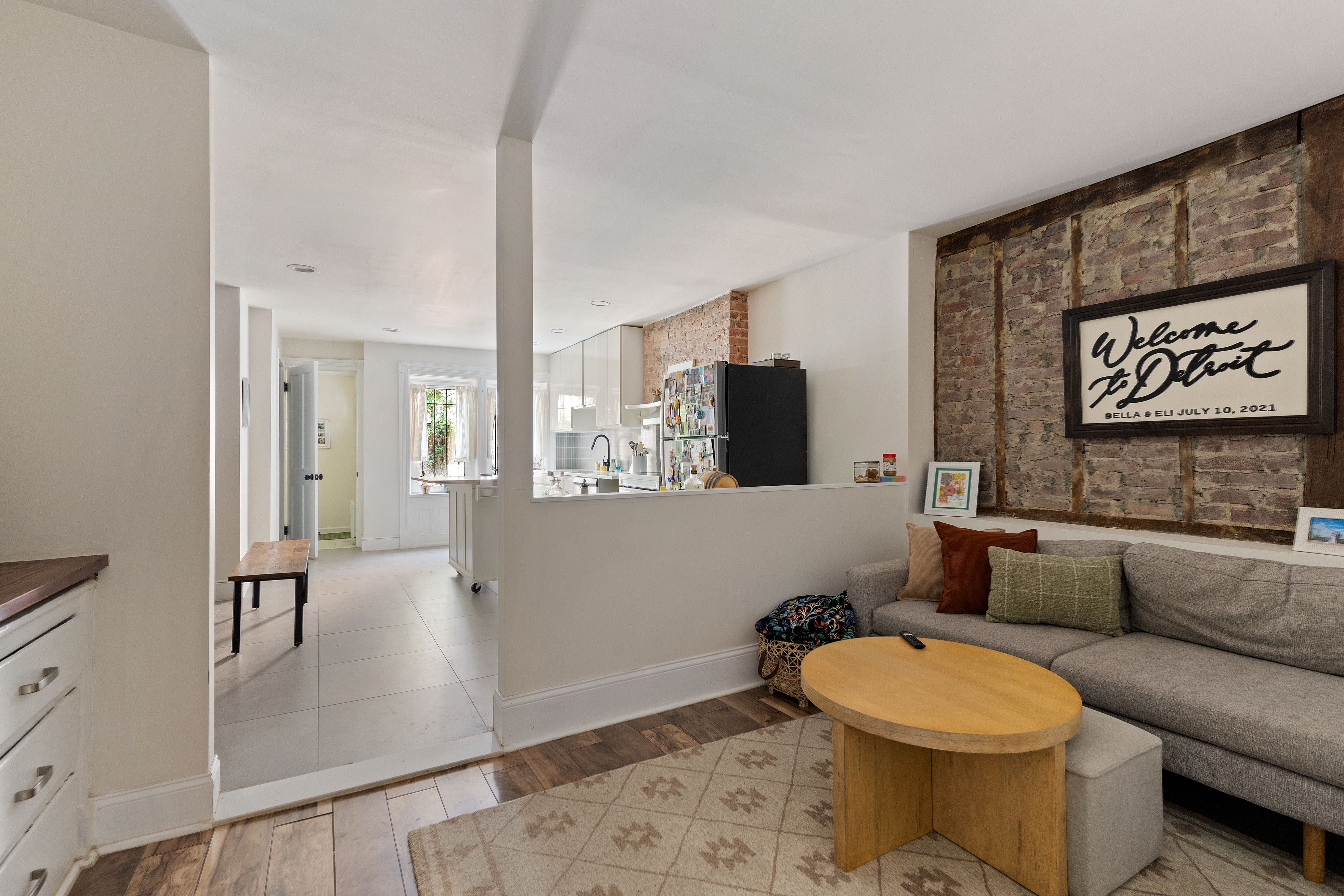 285 Weirfield Street Brooklyn, NY 11221 - Photo 9 of 16 a bathroom with a toilet sink and mirror
