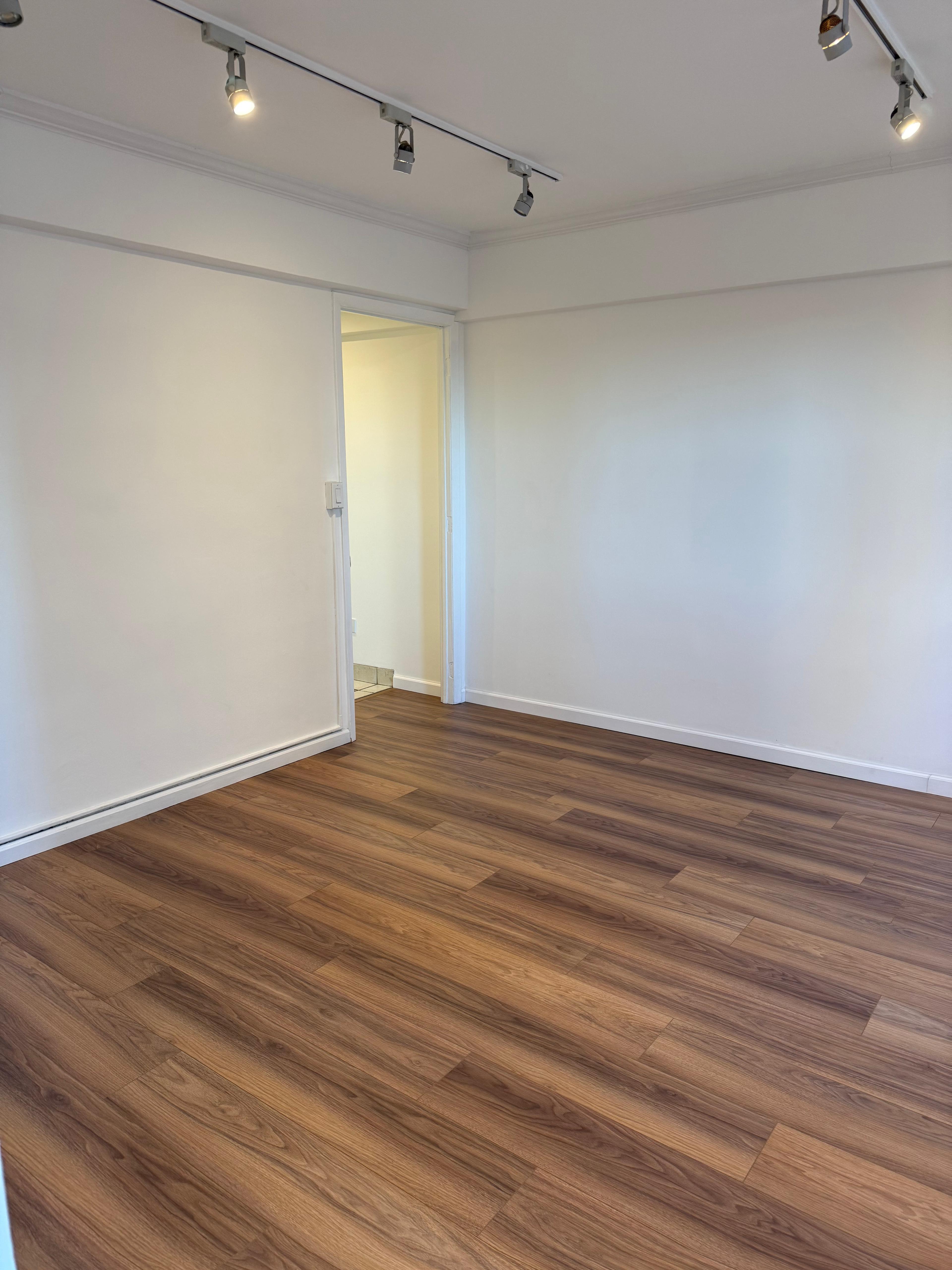 40 Sutton Place, Unit 7A Manhattan, NY 10022 - Photo 2 of 11 a view of room with wooden floor