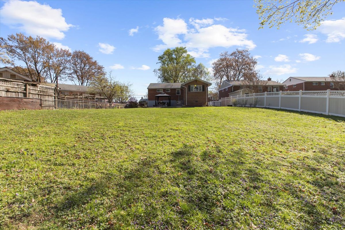 12712 Atherton Drive Silver Spring, MD 20906 - Photo 38 of 40 a house with a garden