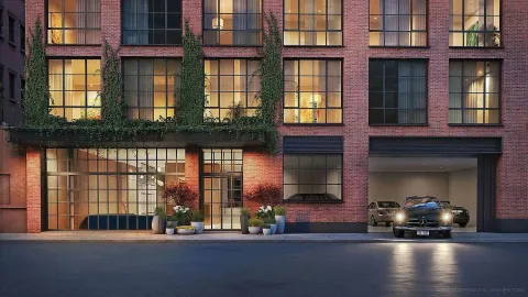 a view of a building with a street