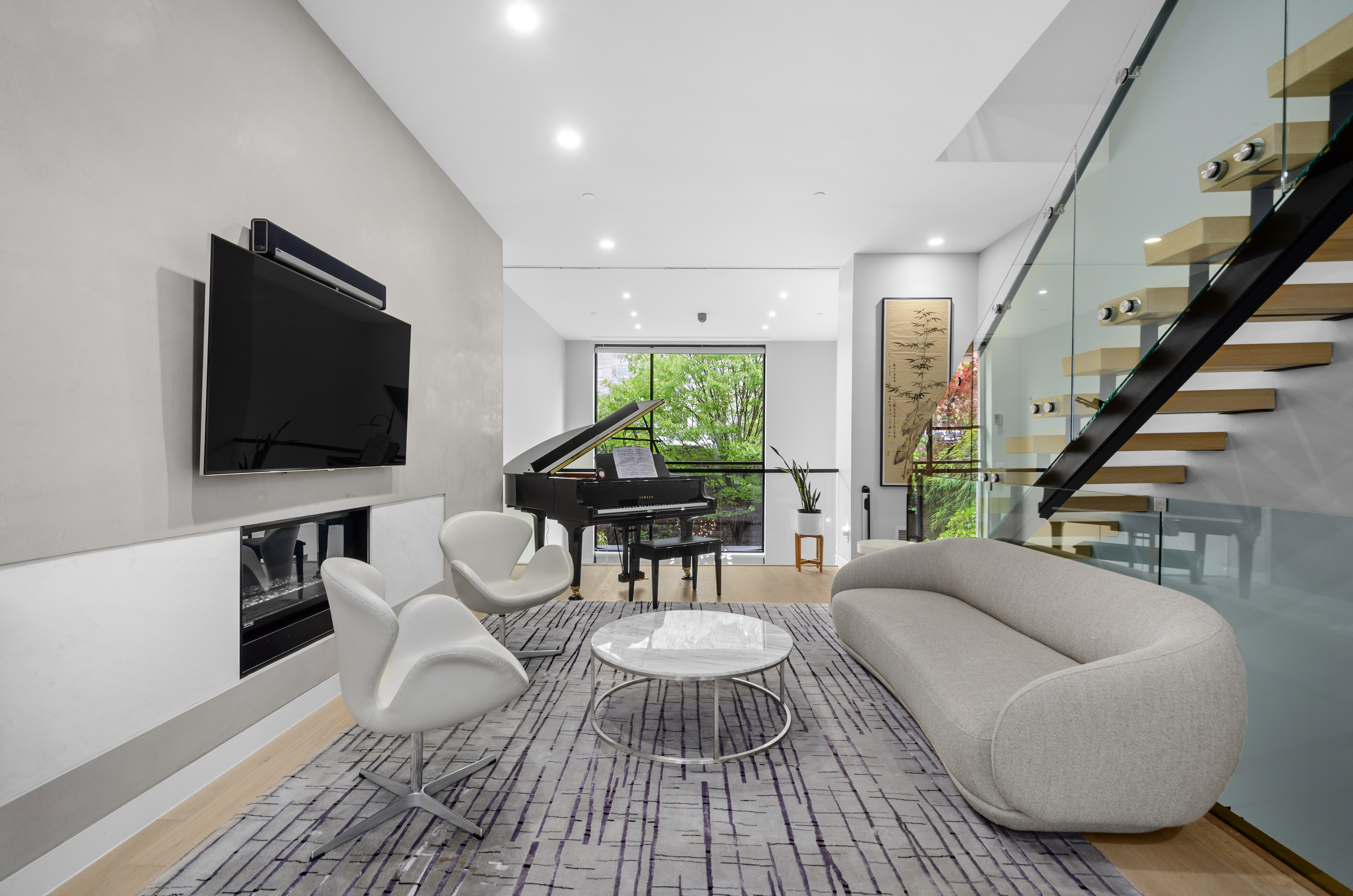 301 State Street Brooklyn, NY 11201 - Photo 5 of 14 a living room with furniture and a flat screen tv