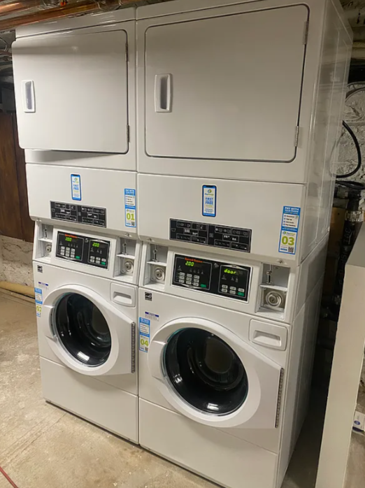 1728 2nd Avenue, Unit 3C Manhattan, NY 10128 - Photo 4 of 4 a utility room with dryer and washer