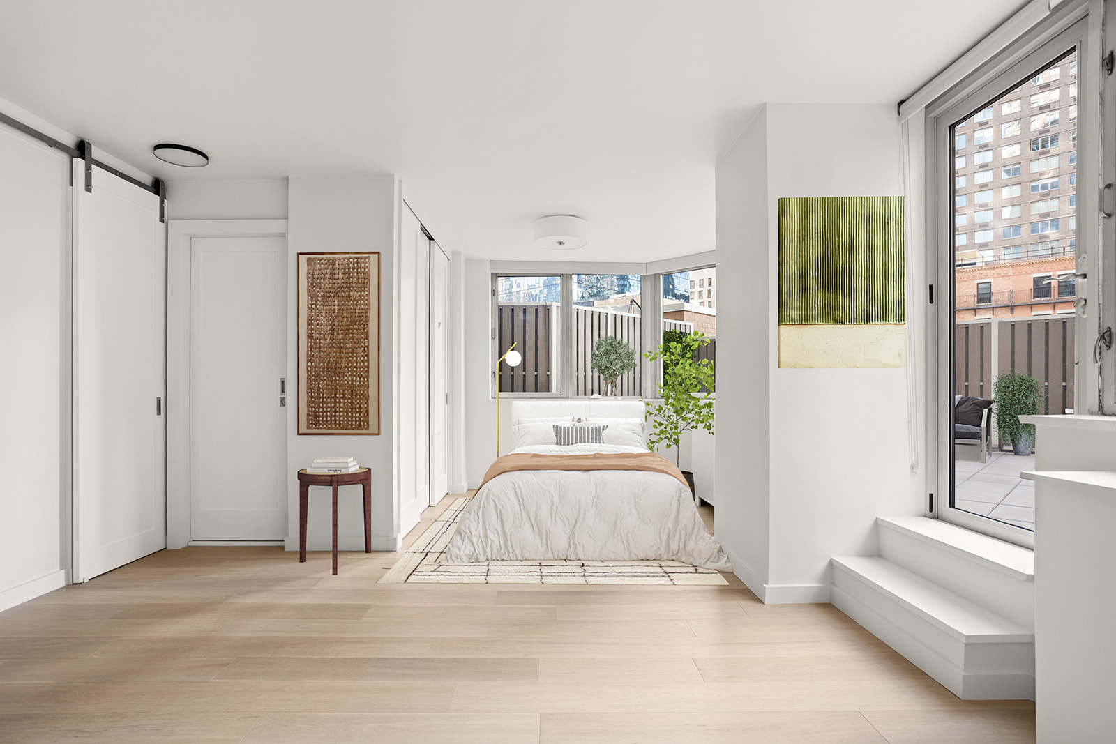 500 West 43rd Street, Unit 3B Manhattan, NY 10036 - Photo 4 of 19 a spacious bedroom with a bed and a large window