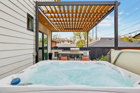 a view of house with a outdoor seating