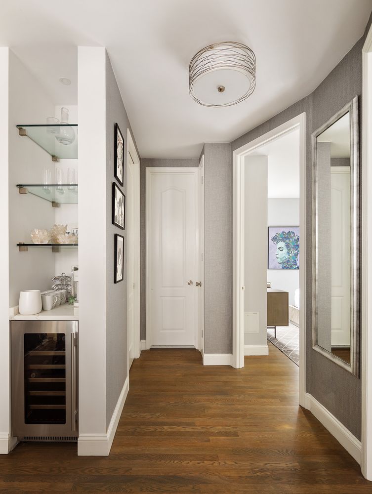 a view of entryway with wooden floor