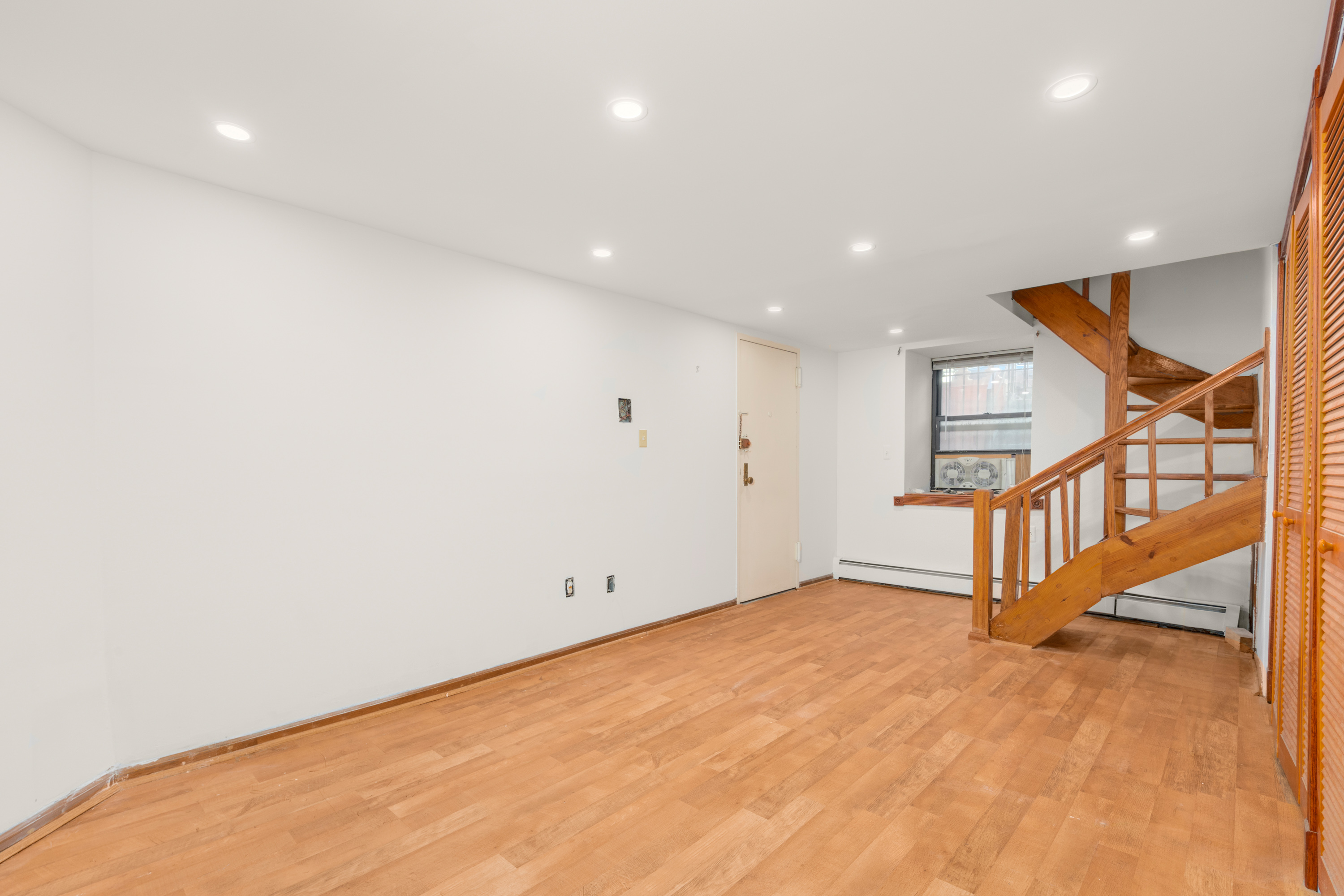 252 West 102nd Street, Unit 1 Manhattan, NY 10025 - Photo 10 of 12 an entryway in an empty room
