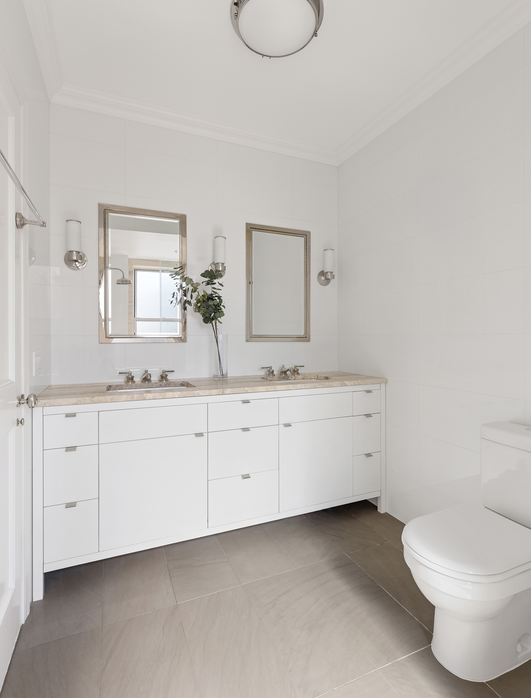 165 West 91st Street, Unit 9AB Manhattan, NY 10024 - Photo 9 of 24 a bathroom with a granite countertop toilet sink and mirror