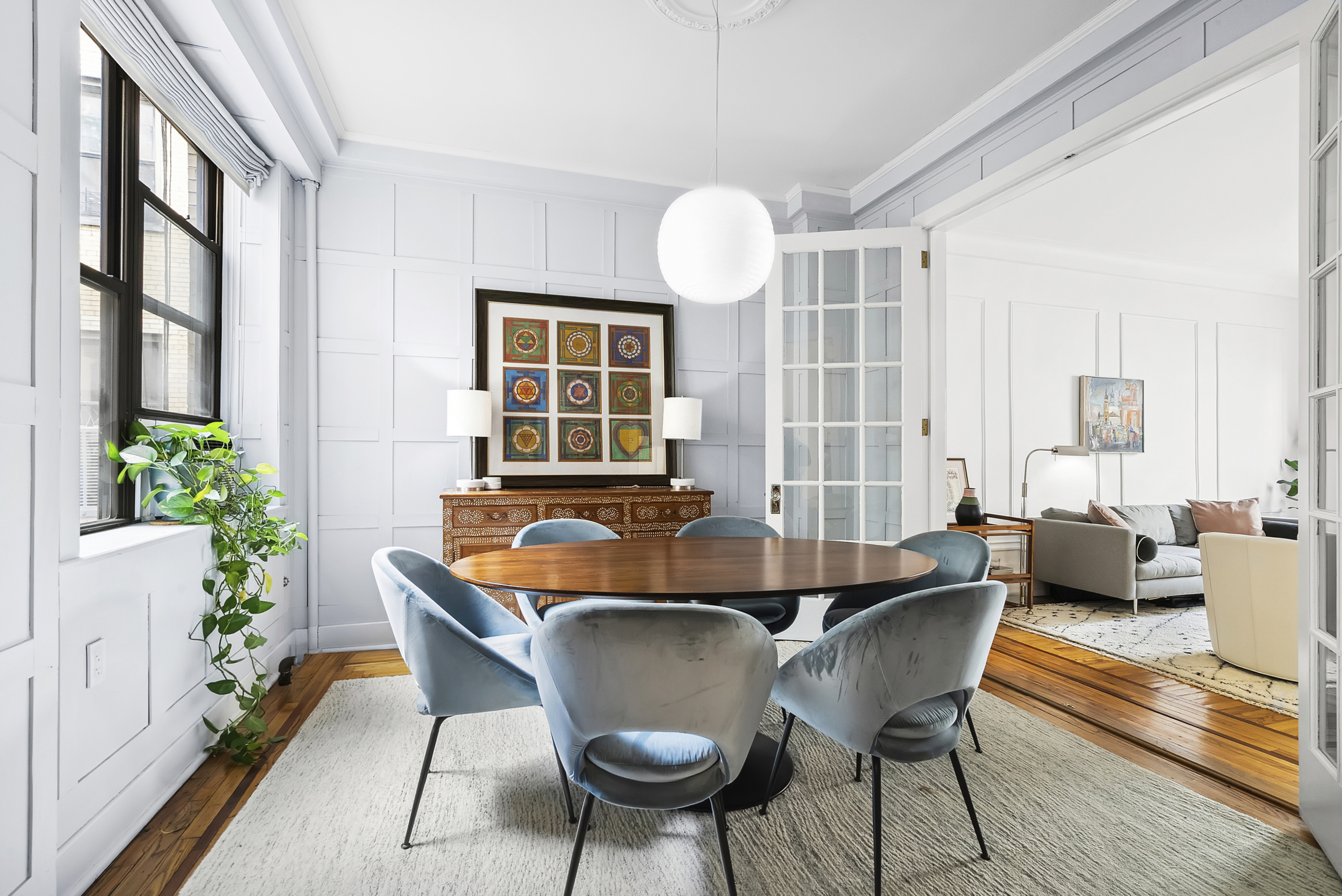 536 West 111th Street, Unit 66 Manhattan, NY 10025 - Photo 3 of 8 a dining room with furniture and window