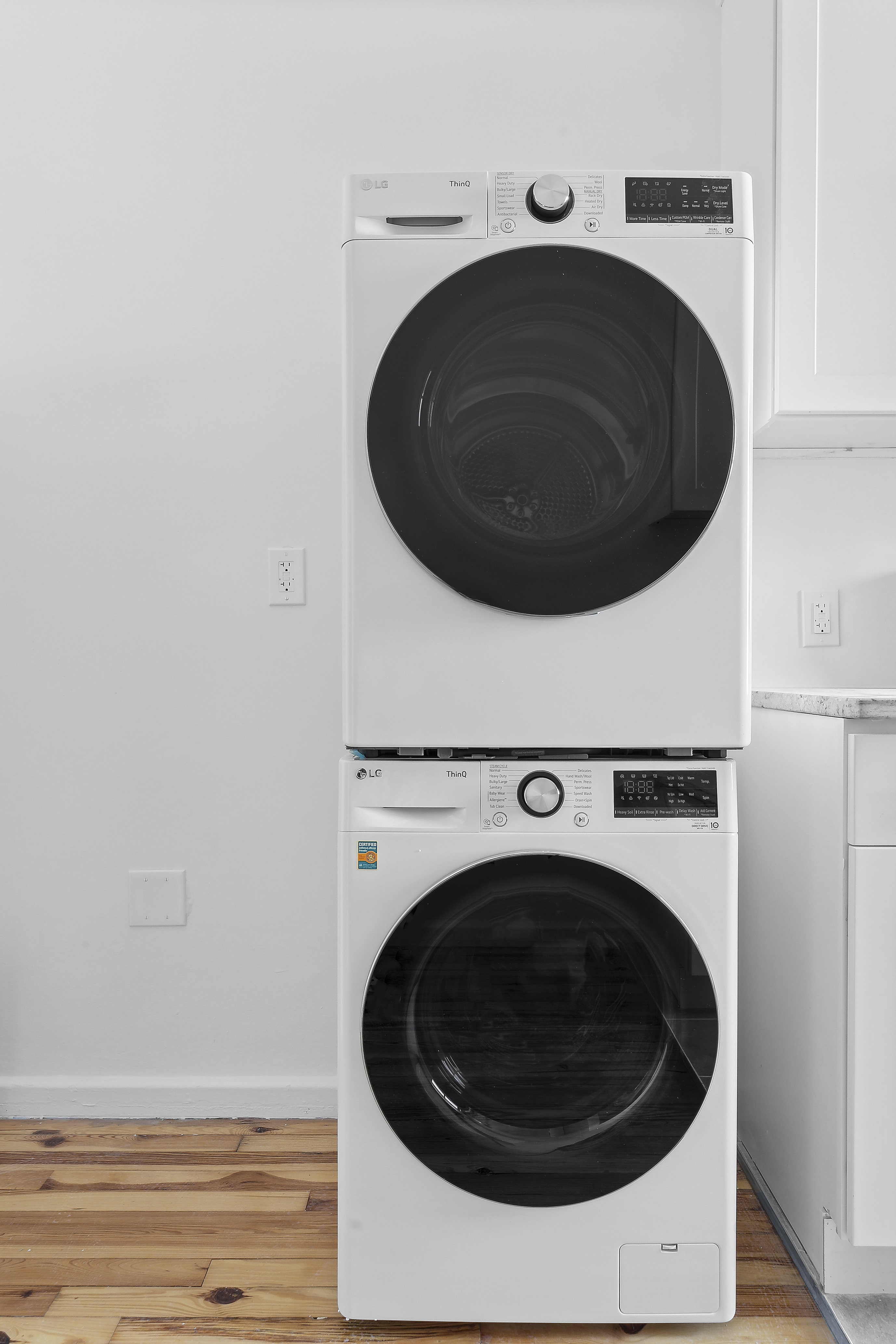 159-34 Riverside Drive West, Unit 5F90 Manhattan, NY 10032 - Photo 7 of 23 a utility room with dryer and washer