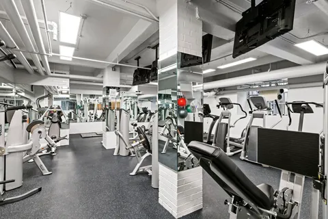 a view of a room with gym equipment