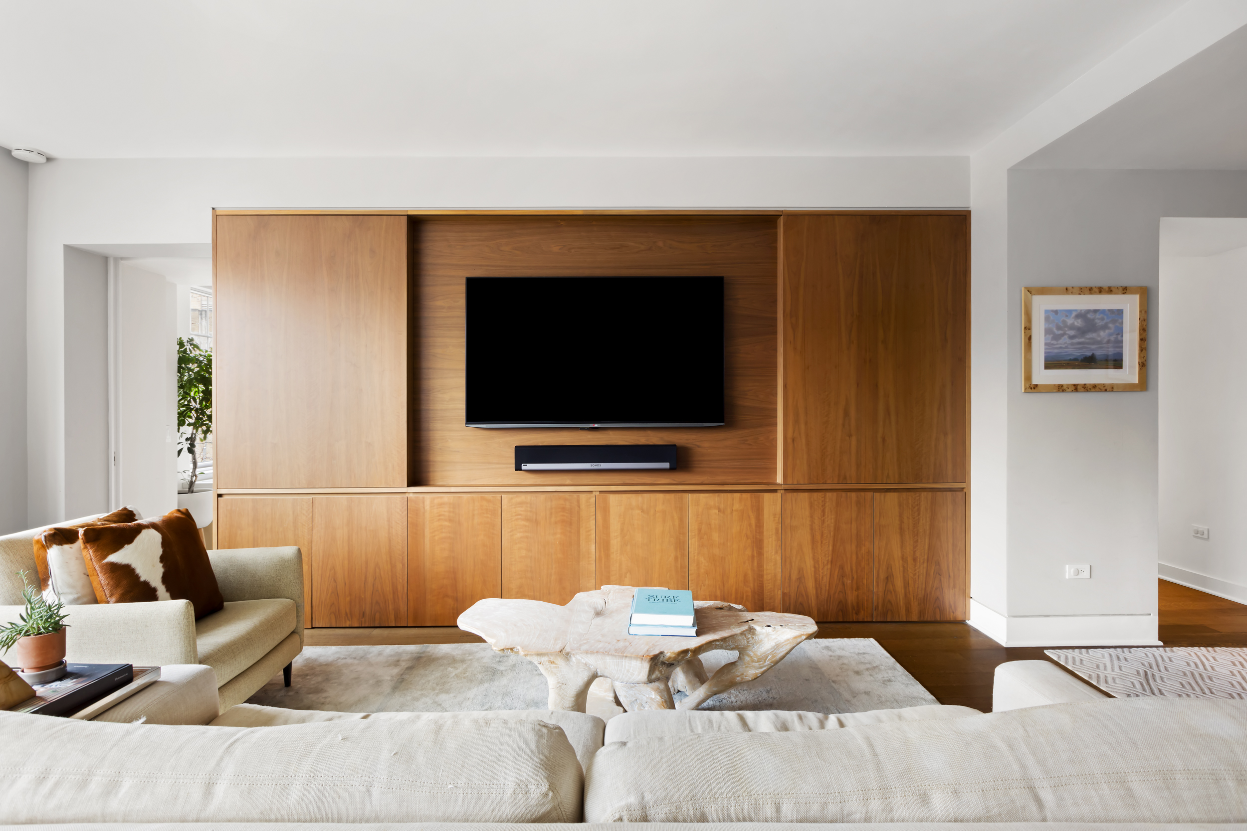 2 Horatio Street, Unit 4JS Manhattan, NY 10014 - Photo 6 of 20 a living room with furniture and a flat screen tv